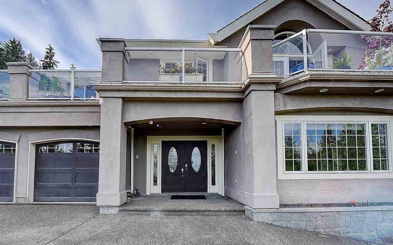 Well Maintained South Facing Home in West Van with Ocean and City View