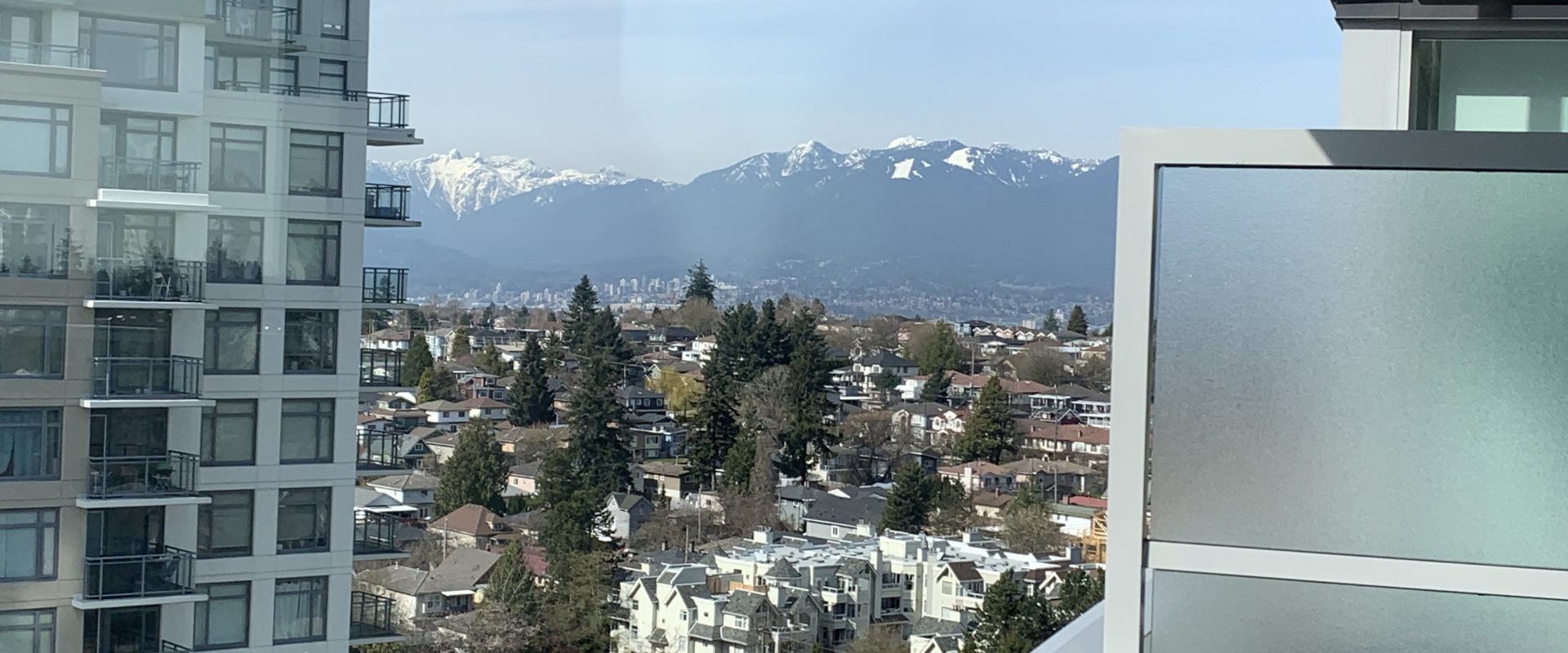 Vancouver East High Rise Condo with Mountain Views for Rent